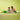 lego duplo 10913 brick box 65 piece set. shows 2 toddlers playing with the fully laid out brick set.