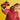 shows a child holding up the ninjago race car to the camera.
