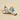 shows a close up of the lego space shuttle resting on the floor.