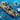 Lego 60368 Artic Explorer Ship 815 piece set. shows the back of the ship as the middle opens up, there is a crane with a diving machine being lowered, a helicopter, a boat and orca and a range of minifigures.