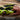 lego technic 42161 lamborghini huracan 806 piece set. shows hands opening the authentic car doors of the lego technic lamborghini.