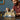 lego harry potter 76419 hogwarts castle and grounds 2660 piece set. shows the fully built hogwarts castle displayed on a table as a man adjusts the final piece.