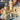 lego harry potter 76419 hogwarts castle and ground 2660 piece set. shows a close up of a section of the castle and ground, displaying a tower and building atop the cliff steps and the water.