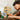 Lego Jurassic 76964 T. Rex Skull 577 piece set. Shows a close up of a child holding the fully built T. Rex Skull.