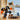 Lego Ninjago 71806 Cole's Elemental Mech. Shows a close up of Cole's Elemental Mech fighting a ninjago minifigure