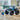 Lego City 60402 Blue Monster Truck. Shows a close up of the fully built blue monster truck and driver minifigures displayed on a table.