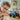 Lego City 60402 Blue Monster Truck. Shows a young boy playing with the fully built blue monster truck.