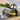 Lego City 60401 Cement Steamroller. Shows a close up of the cement steamroller flattening cement.