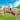 lego friends 42634 horse trailed. shows a close up of the minifigures driving the trailer with a horse and foal.