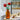 lego flowers 40460 roses 120 piece set. shows the fully built lego roses sitting in a vase.