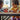 Lego Star Wars 75384 The Crimson Hawk. Shows a young girl and mother playing with the fully built set.