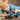Lego Technic 42164 Off-Roa Buggy. Shows a young boy playing with the fully built technic off-road buggy.