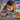 lego friends 42610 karaoke party. shows a young girl playing with the fully built set.