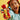 lego creator 31145 red dragon. shows a child holding up the fully built red dragon to the camera.