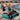 lego city 60400 go karts. shows a close. up of one of the go karts and the 2 minifigures, one holding a trophy.