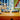 Lego Speed Champions 76922 BMW M4 & BMW Hybrid V8. Shows a close up of the 2 fully built Lego BMW model cars displayed on a desk.
