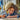 lego ninjago 71810 young dragon riyu. shows a young child playing with the fully builty riyu dragon and ninjago minifigures.