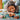 lego harry potter 76425 hedwig at privet drive. shows a young girl adjusting hedwig's wing