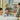 Lego Gabby's Dollhouse 10796 Kitty Care Ear. Shows 2 children playing with the fully built set.