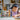 Lego Creator 31153 Modern House. Shows a young girl playing with the fully built Modern House model.
