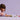 Lego Friends 42635 Dog Grooming Car. Shows a young girl playing with the dog grooming car set and minifigures.