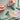 Lego Botanicals 10347 Petite Sunny Bouquet 373 piece set. Shows a close up of hands putting the pieces of the flowers together.