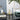lego architecture 21028 new york. shows a faraway photo of the fully built set displayed on a desk.